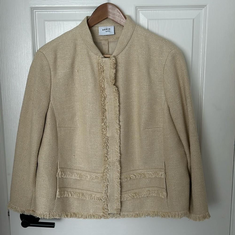 Linen blazer with fringe detail.